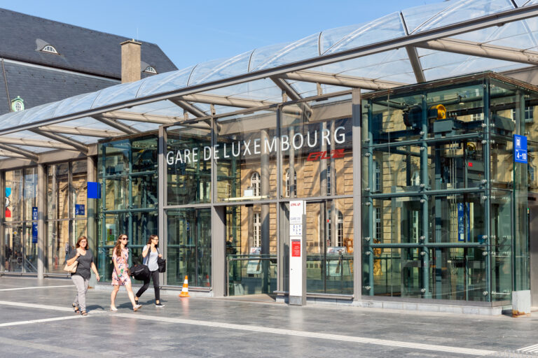 Luxembourg city, Luxembourg- August 19, 2018: Railway station Luxembourg city with three walking woman